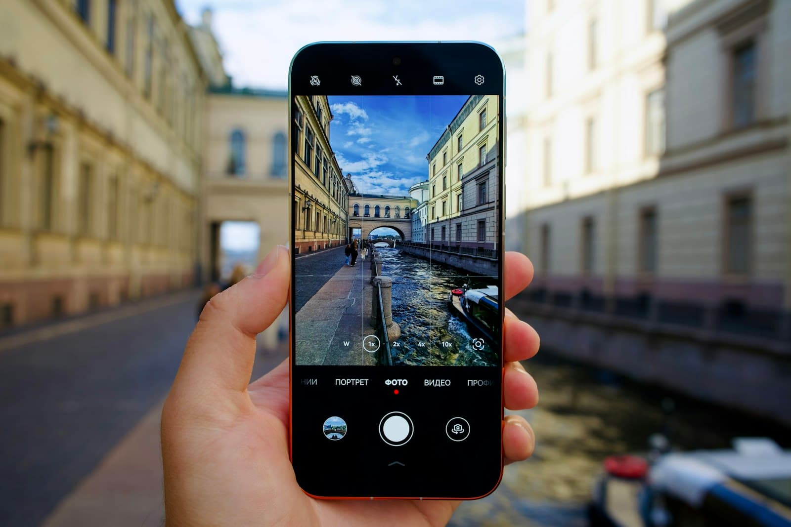 Traveler holding a phone in the city